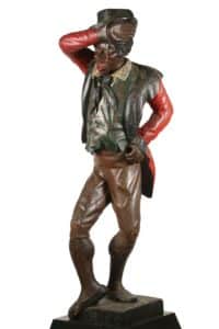 Gavels 'n' Paddles: Carved minstrel figure, $157,950, Thomaston Place
