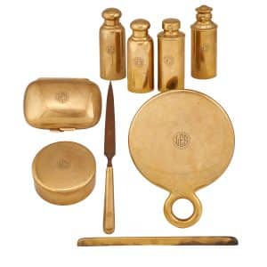 Gavels 'n' Paddles: Tiffany 18kt gold dresser set, $21,250, Rago Arts & Auction