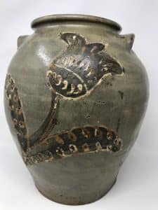 clay jar with flower