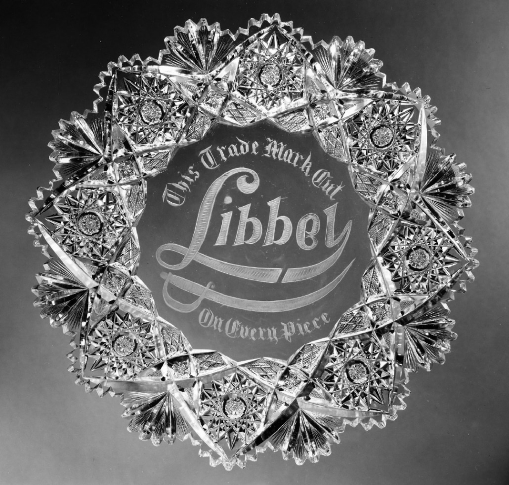 Glass plate with the Libbey logo inscribed.