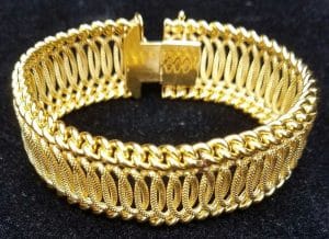 Signed Cartier bracelet and the Cartier mark on a ring