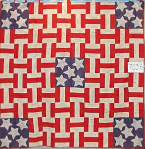 Civil War Memorial Quilt from the Quilt Index and the Massachusetts project. Each of the white strips and the stars are inscribed with the name of a Massachusetts soldier, his company and the date he enlisted.