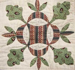 Oak Reel block dated 1846, Enoch and Mary Worrall quilt, dated 1850. (Starley Quilt Collection)