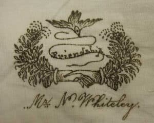 Rolling Stone Friendship block, shows hands with word Friendship, c. 1850, Pennsylvania. (Starley Quilt Collection)