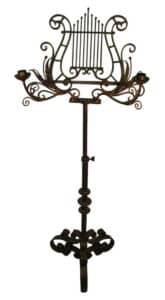 19th century hand wrought music stand with candle holders selling on 1st dibs for $2,195