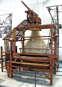 A carpet loom by Carl Engel with a Jacquard machine on top, ca. 1860. Photo by Dmm2va7; CC BY-SA 3.0