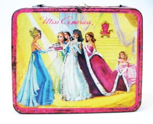 Rare Vintage 1972 Miss America Pageant Metal Lunchbox by Aladdin Industries featuring the bathing suit competition, ball gown competition, the crowning of the new Miss America and the talent competition. Copyright 1972 Miss America Pageant. Selling for $208 at Etsy.