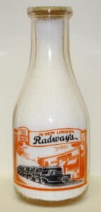 Two color pyro bottle illustrated with bottling plant and delivery trucks.