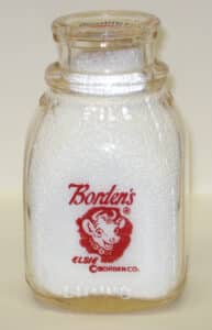 Elsie the Cow, Borden’s mascot, used on a school size milk bottle.