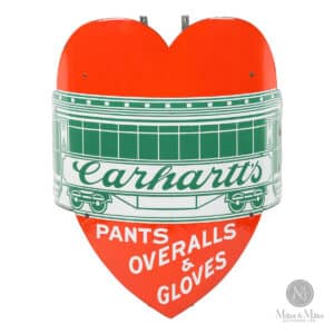A circa 1905 Carhartt’s Overalls single-sided porcelain corner sign (left), graded 9, 22 inches by 18 inches, gaveled for $20,300 at Miller and Miller in Ontario, Canada.