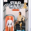 A Star Wars 1978 “Double Telescoping” Luke Skywalker production action figure, graded AFA 90, one of only two examples graded at that level, sold for $100,252 at a Spring Premier Auction held June 12th by LCG Auctions in New Orleans, LA.
