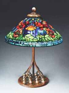 A rare, circa 1905-1910 Tiffany Studios Poppy leaded-glass table lamp sold for $541,200 at a Fine & Decorative Arts Auction held June 8-10 by Morphy Auctions in Denver, PA.