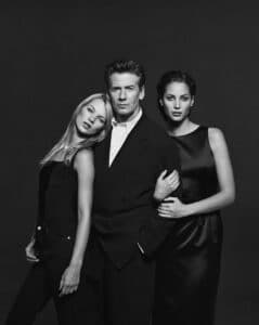 Calvin Klein with two of his favorite models, Kate Moss (l) and Christy Turlington (r).