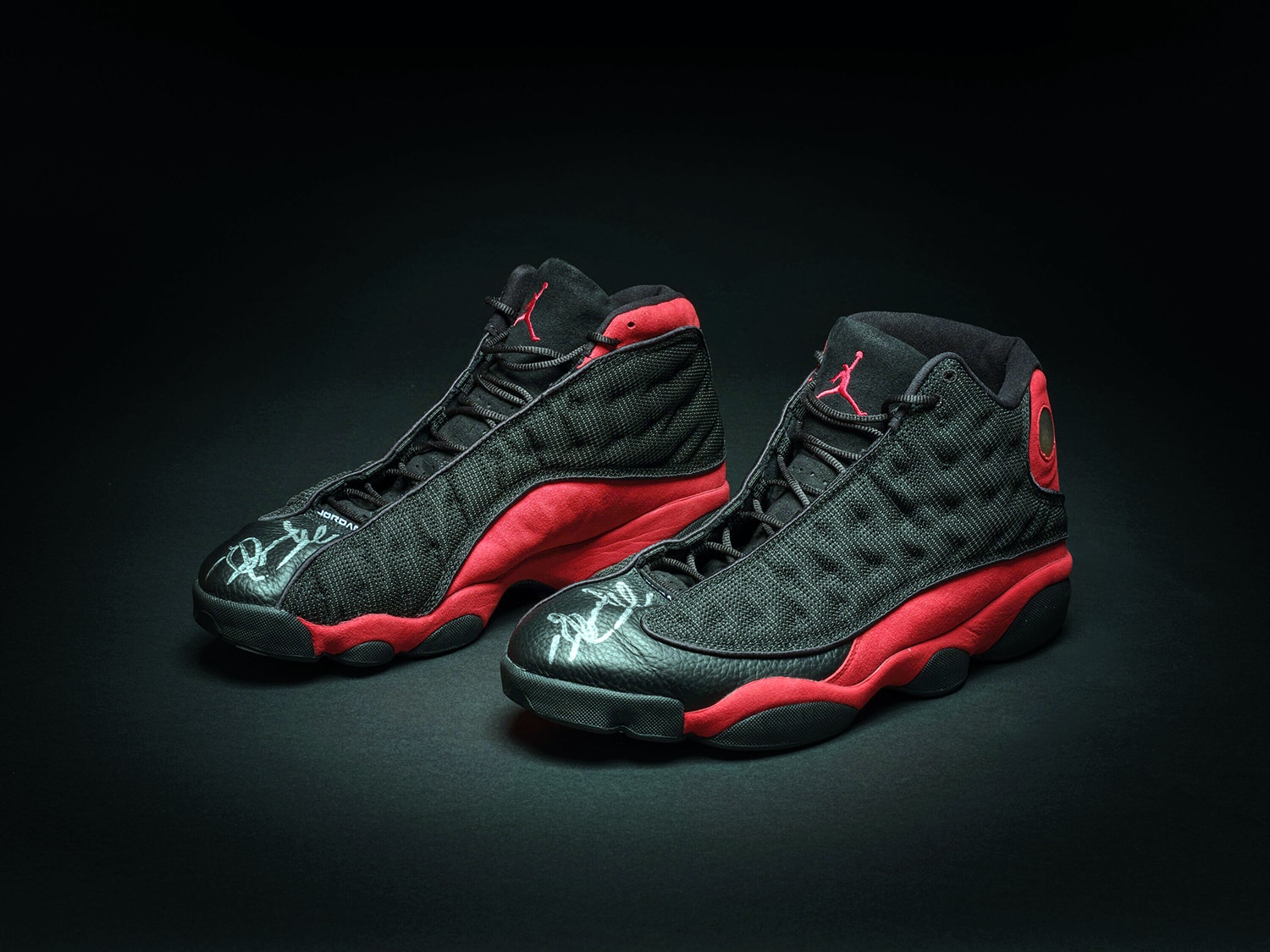 pair of Air Jordan 13S sneakers