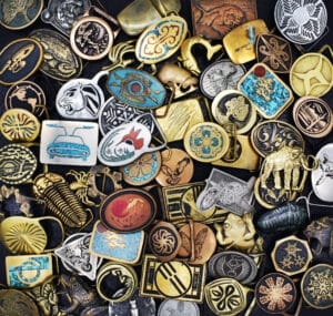 Title image: A portion of the Author’s collection of vintage belt buckles.