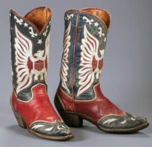 a custom-designed boot made by Rocket Buster Boots and designed with Roy Rogers about 32 years ago. These boots were first available by custom order at the Roy Rogers Museum and were autographed by Roy himself.