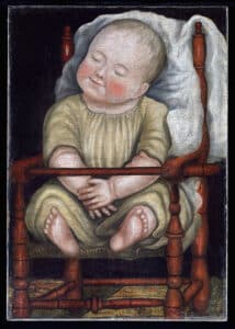 Figure 3: Baby in Red Chair, possibly Pennsylvania, 1810-1830, oil on canvas, 24 1/4 x 17 1/2 inches, Colonial Williamsburg, from the Abby Aldrich Rockefeller Collection, gift of David Rockefeller. This now iconic image of a sleeping baby was one of the first folk art objects purchased by Rockefeller from Halpert.