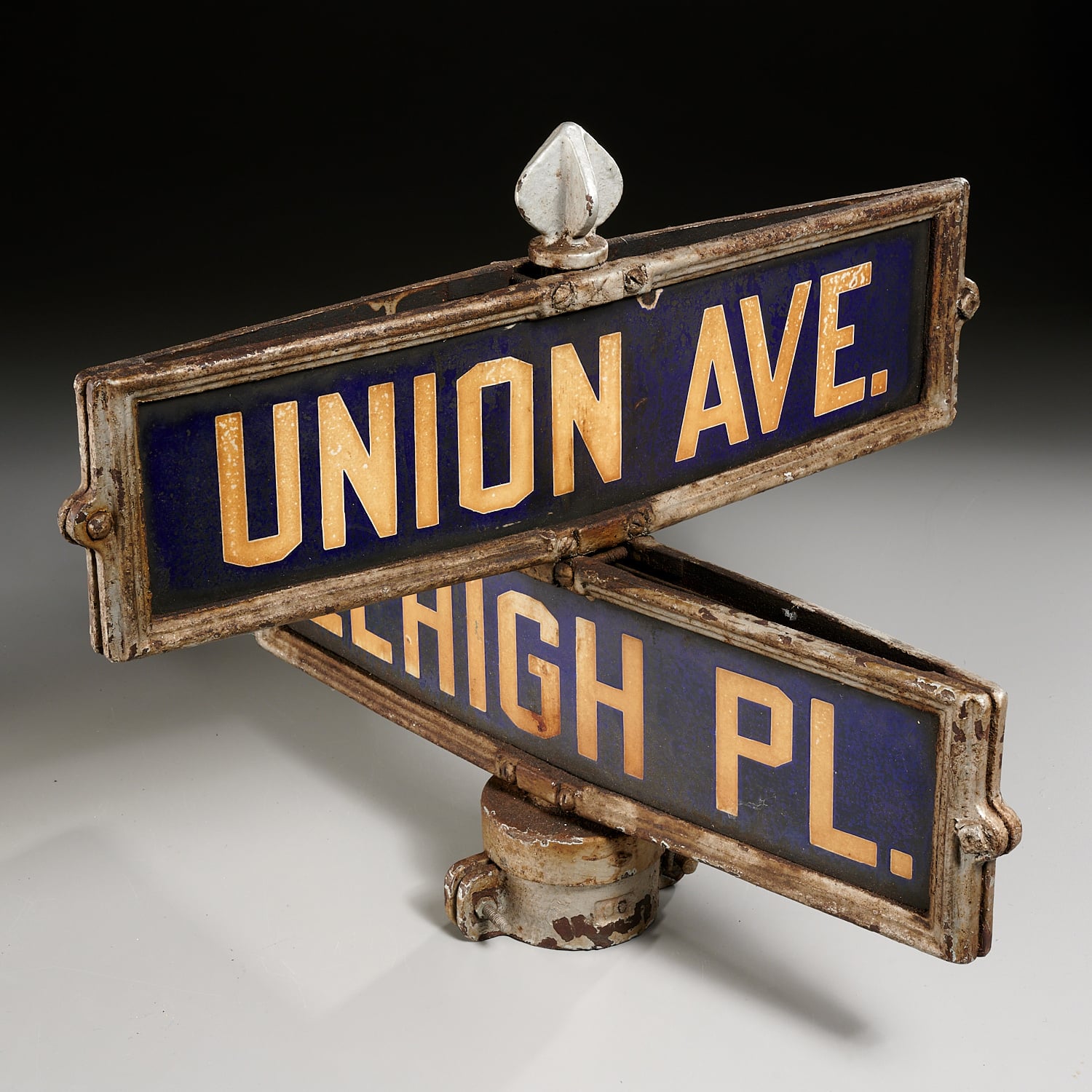 Sold at MilleaBros.com, this cross sign shows Union Avenue and Lehigh Place. First half 20th c., probably Irvington, NJ, double-sided metal signs bolted to intersection street post cap, 16.5” h x 20.5” w x 20.5” d. Sold price was $150, just over the estimate of $80-$125.
