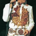 Elvis wearing Mexican sundial jumpsuit