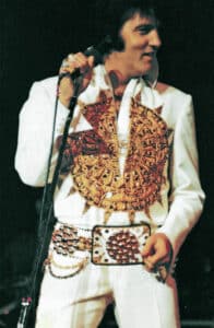 Elvis wearing Mexican sundial jumpsuit