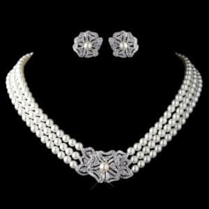 This classic 1950s Bridal Set with pearls and mounted on sterling is sure to set off any wedding outfit, vintage or otherwise. Selling on eBay for $140.