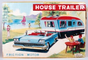 The pinnacle of Summertime fun: Haji’s tinplate travel trailer set.