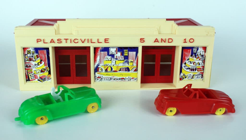 Cheerio and Allied convertibles arrive for some shopping at the five and dime in Plasticville.