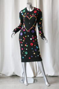 Patrick Kelly fashion designer, Boho chic outfit, button fashion.