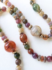 Vintage 1980s very long autumn colors bead necklace costume jewelry