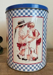 Vintage Fieldbrook Farms Old Fashioned Ice Cream Tin. (Lid pictured at right.) Perfect for an ice cream lover or use as fun summer decor. Fieldbrook Farms is/was located in Dunkirk, NY. The artwork was done by Gene Pressler. The blue and white checked tin measures approximately 8 3/8” x 6 1/2” and is in great vintage condition. Photo: OurRetroReflections on etsy.com