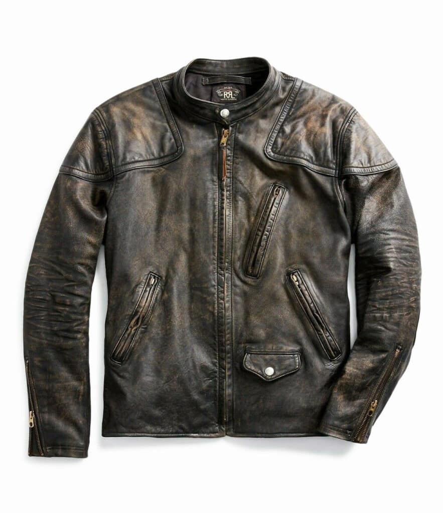 At right: Inspired by a late-1940s motorcycle jacket from Mr. Lauren’s personal collection, this 1970s vintage jacket is made from vegetable-tanned cowhide with a black-over-brown hue. Distressed finish achieved through a multistep process that allows the piece to continue to age with wear. Padded shoulder and elbow patches. Café racer–style stand collar. Fully lined with twill. Selling online for $2,290 at uncommon-threadz.com