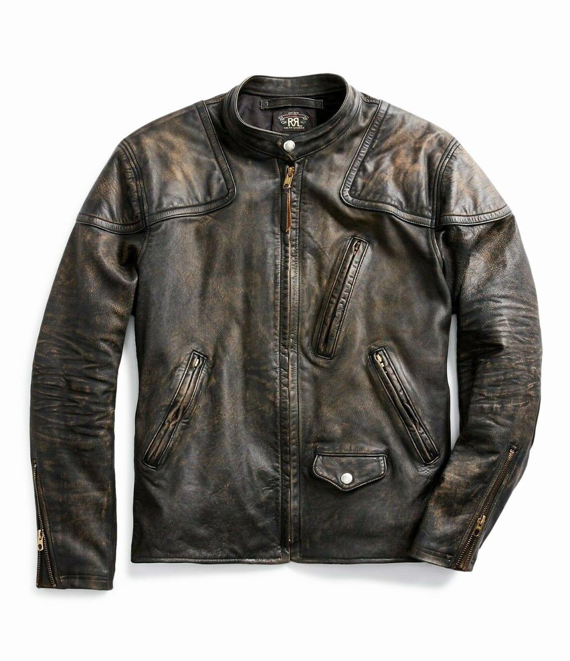 At right: Inspired by a late-1940s motorcycle jacket from Mr. Lauren’s personal collection, this 1970s vintage jacket is made from vegetable-tanned cowhide with a black-over-brown hue. Distressed finish achieved through a multistep process that allows the piece to continue to age with wear. Padded shoulder and elbow patches. Café racer–style stand collar. Fully lined with twill. Selling online for $2,290 at uncommon-threadz.com