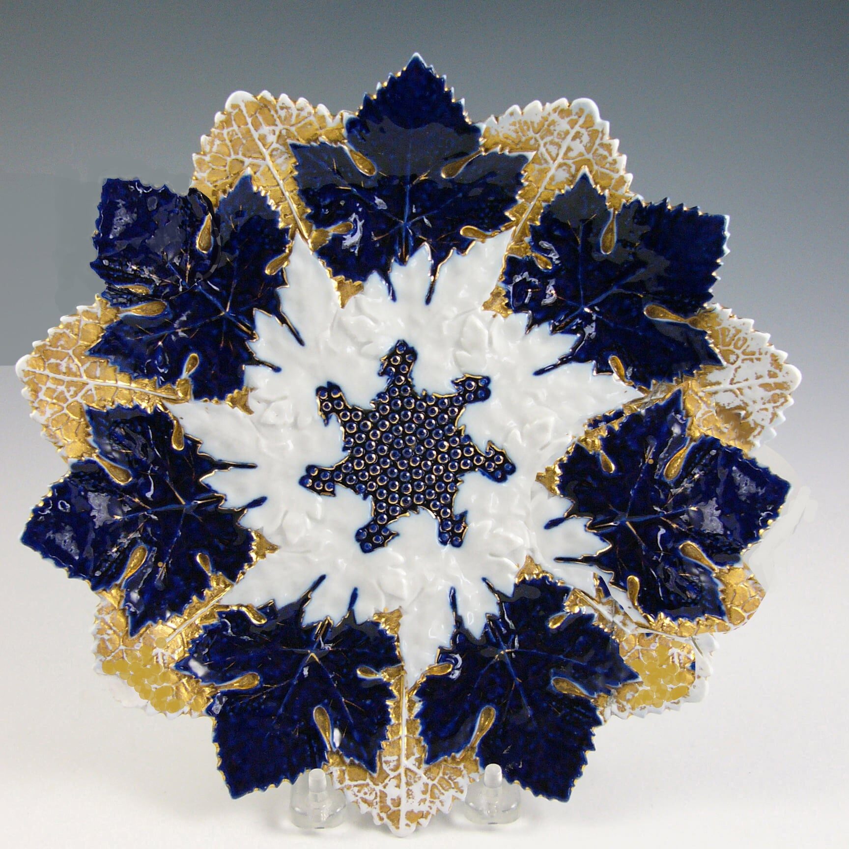 Glorious star-shaped display plate in navy and gold, unmarked.