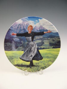 “The Hills Are Alive.” Artist Victor Gadino’s rendition of an iconic scene from The Sound of Music. The plate was one of a series released by W. F. George Fine China in 1991.