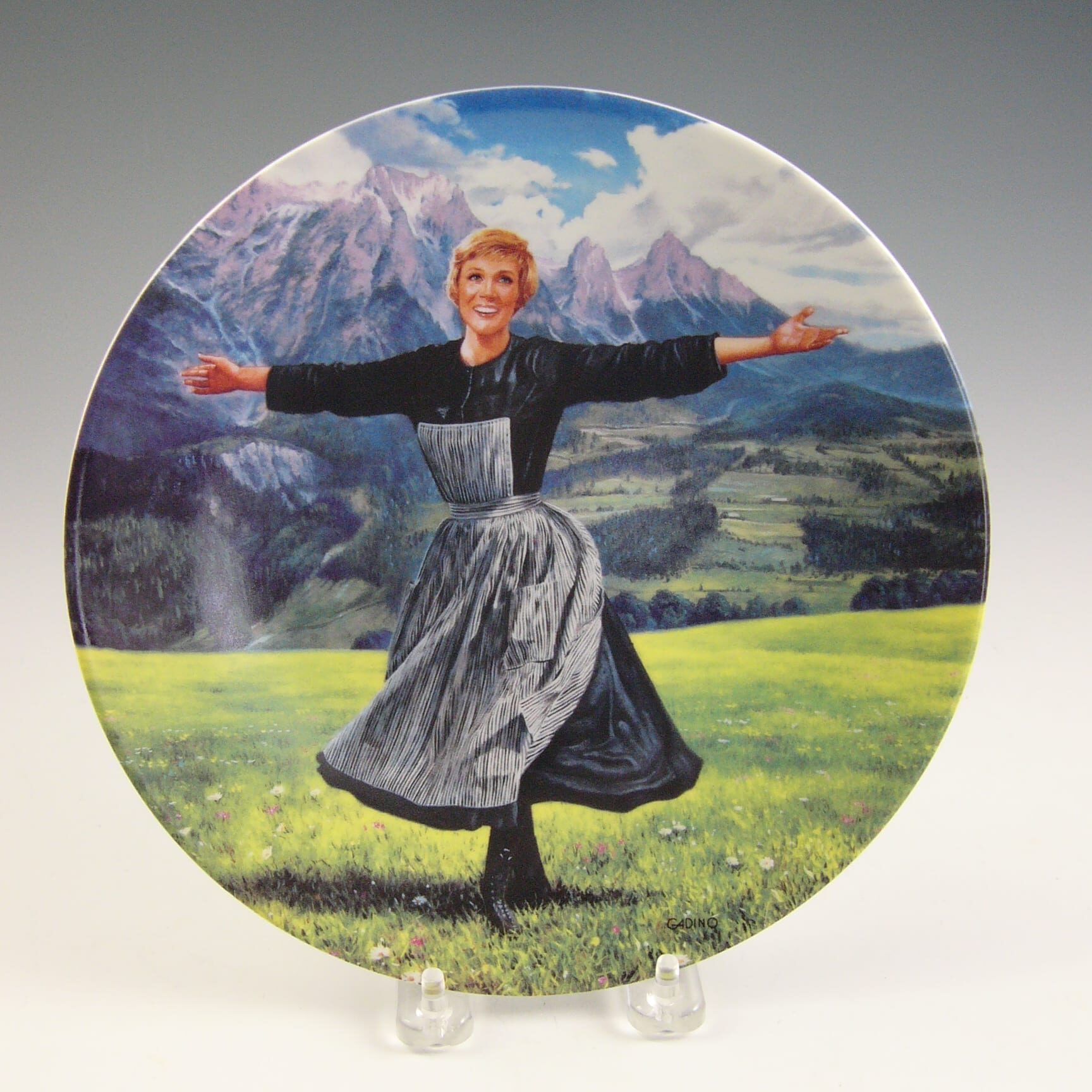 “The Hills Are Alive.” Artist Victor Gadino’s rendition of an iconic scene from The Sound of Music. The plate was one of a series released by W. F. George Fine China in 1991.