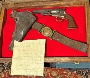 The belt is a classic Richmond depot-issued sword belt with a 2-piece “CS” belt plate, though the sword hangers are detached. The belt is in fine condition, still supple. The accompanying Colt model 1849 pocket revolver is “as found”,