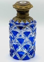 273 Unique (to my knowledge, completely unique) antique cobalt cased
crystal scent bottle with roulette wheel on the cap, 3 3/4 inches tall