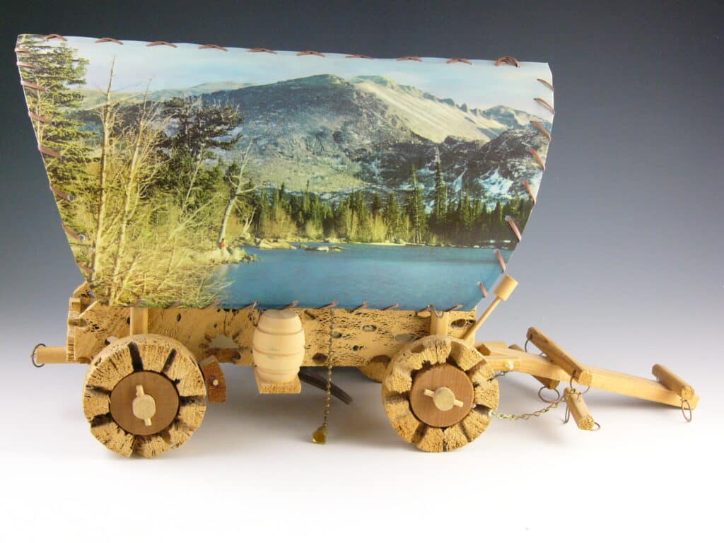1. On the way west: covered wagon lamp with scenic shade. The base wood 
is chollas, a type of cactus.