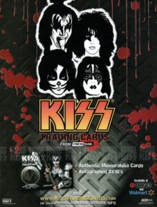 Promotional poster for KISS Trading Cards by Press Pass, showcasing iconic artwork of the band’s four original members. These cards feature authentic memorabilia, autographs, and are available at major retailers—perfect for collectors of music history.