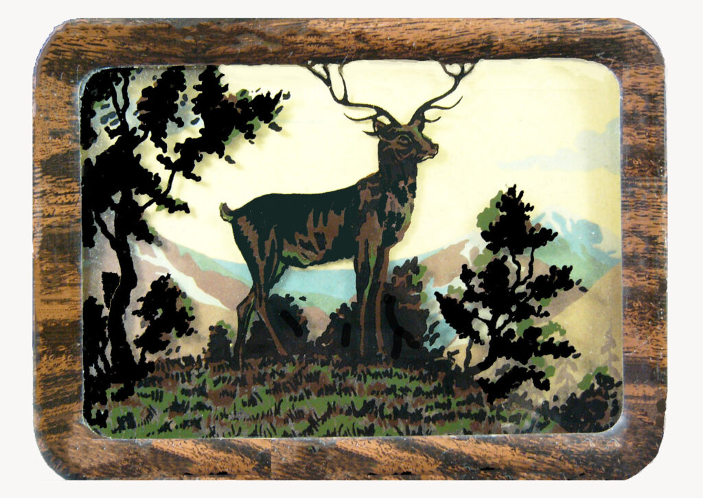 A majestic elk, captured in silhouette.