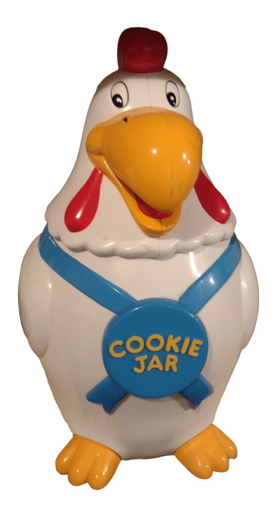 Guarding the treats: rooster cookie jar.