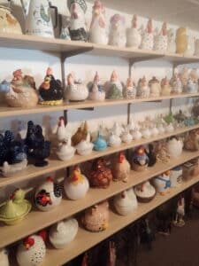 From casserole dishes to cookie jars, these happy hens and roosters are just a sampling of the 10,000 items inside “Amy’s Coop.”