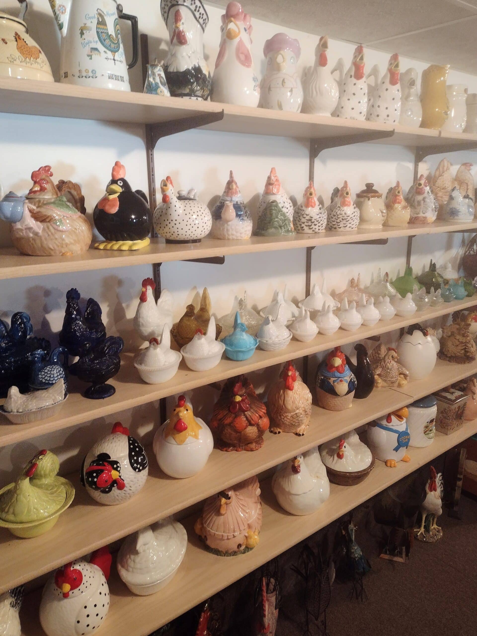 From casserole dishes to cookie jars, these happy hens and roosters are just a sampling of the 10,000 items inside “Amy’s Coop.”