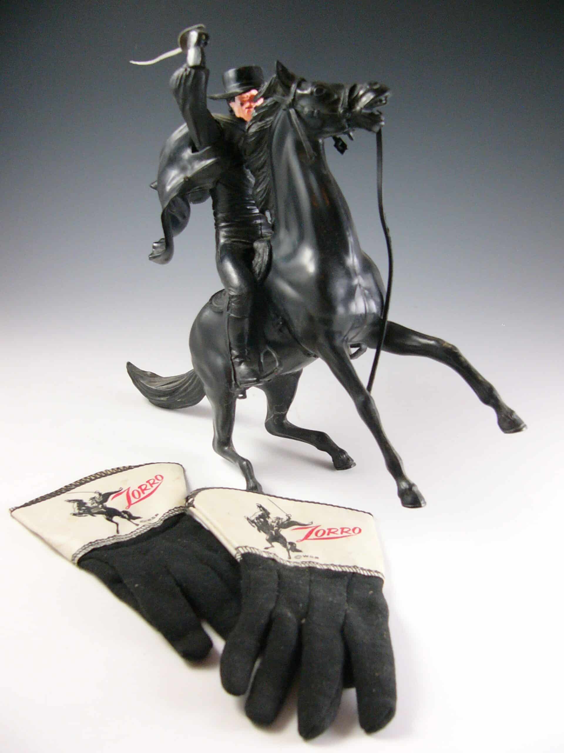 Mementos of a happy childhood: Wayne Babchuk&rsquo;s &ldquo;Zorro&rdquo; gloves and figurine.