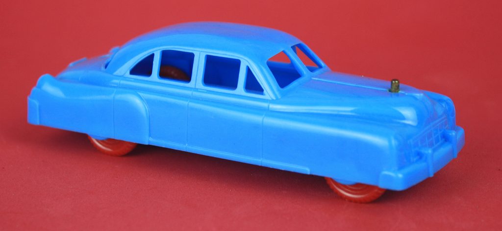 The drain valve on the Fill ’er Up car pokes up through the engine hood.
