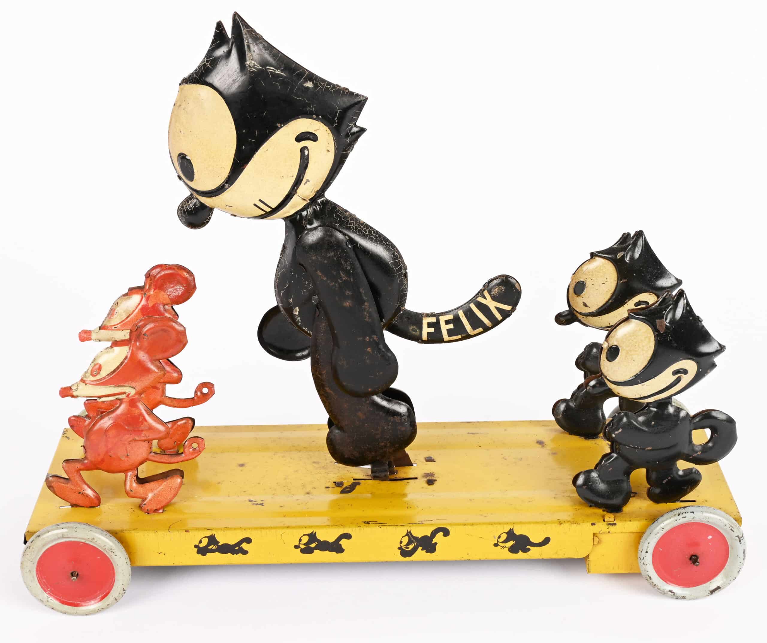 Chein Felix Frolic tin windup platform toy, circa 1926