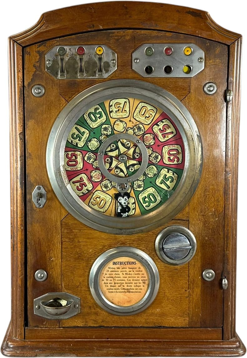 Circa-1930s French coin-operated countertop trade stimulator attributed to Bussoz, featuring early Mickey Mouse, 27 inches tall