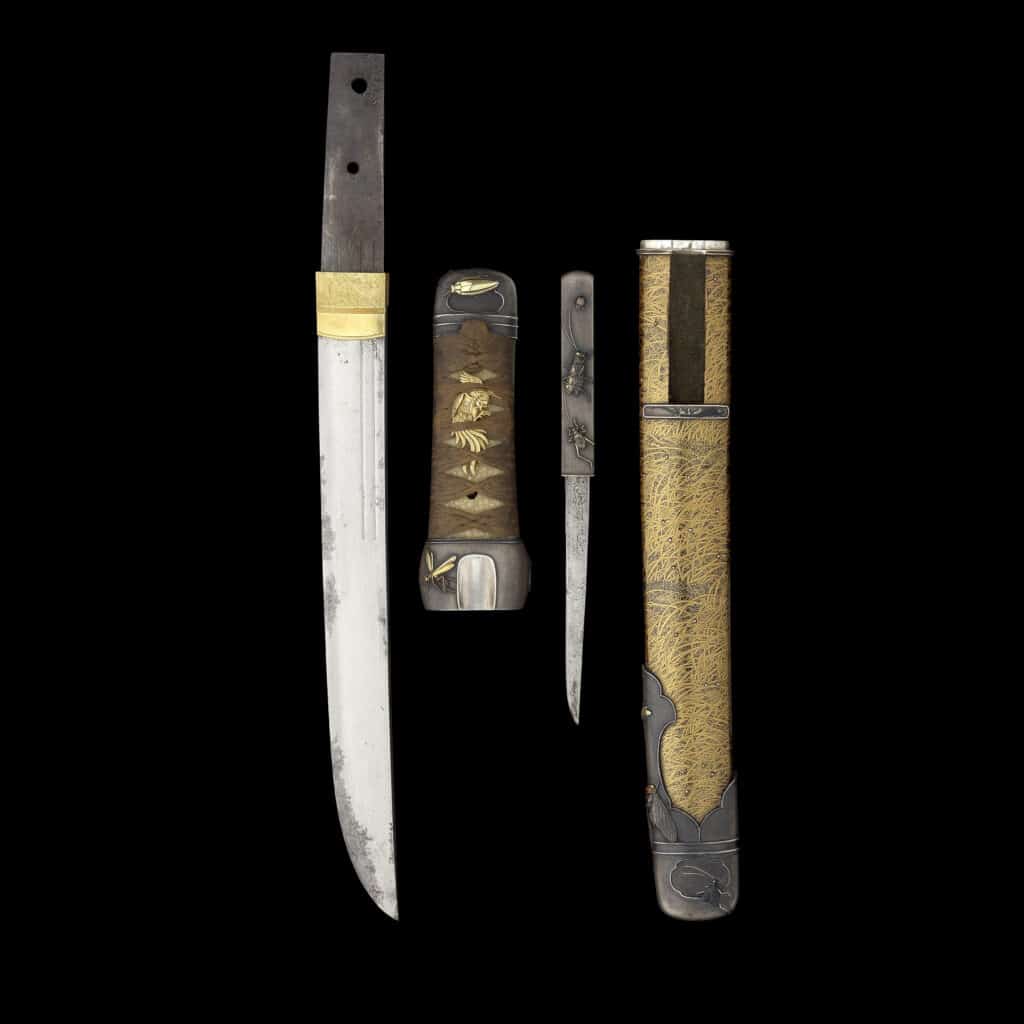 A BIZEN TANTO IN SUPERB MOUNTS WITH ICHIJO SCHOOL FITTINGS Muromachi period 1333 1573 dated 1558