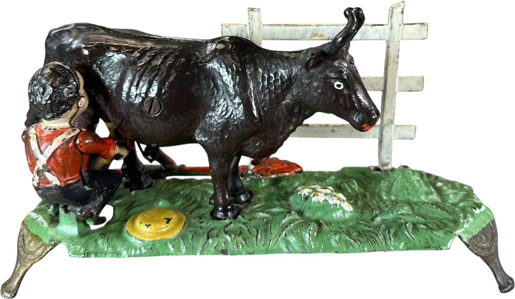 J&E Stevens Milking Cow mechanical bank, thin-base pedestal version