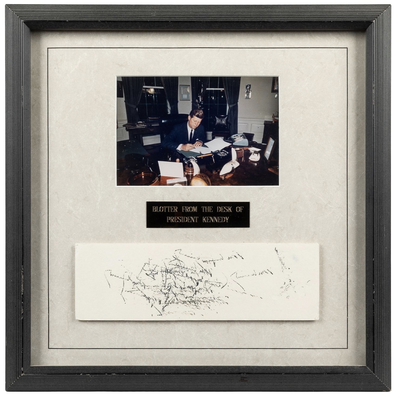 Lot 166: Blotter paper from the Oval Office desk of President John F. Kennedy